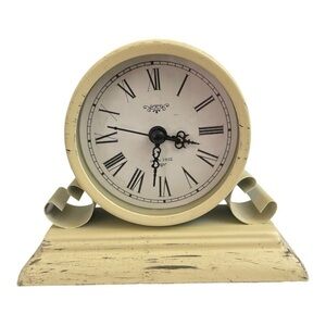 Kirkland’s Distressed Ivory Metal Tabletop
Clock
